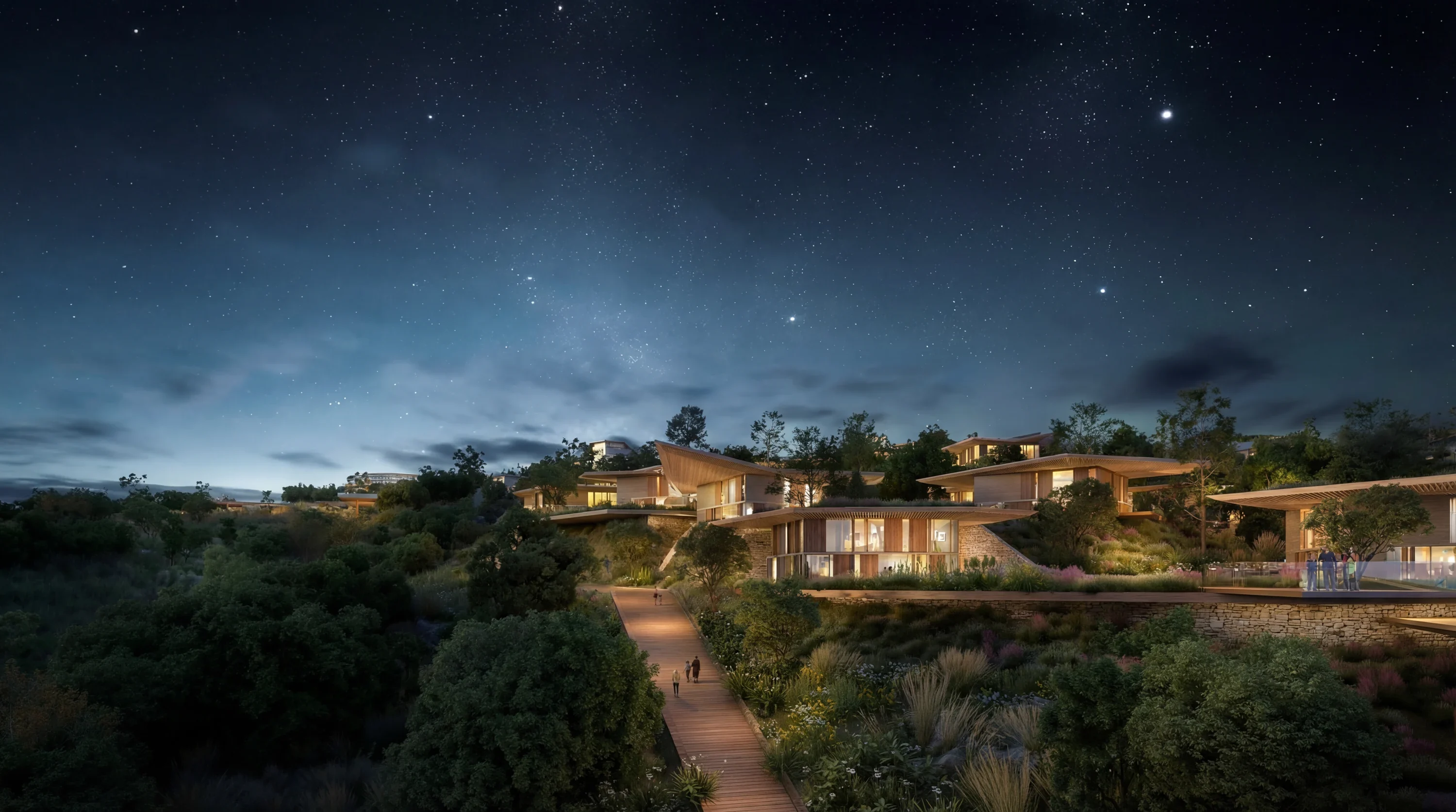 Mira Verde residences and a lit stepped path under a starry night sky