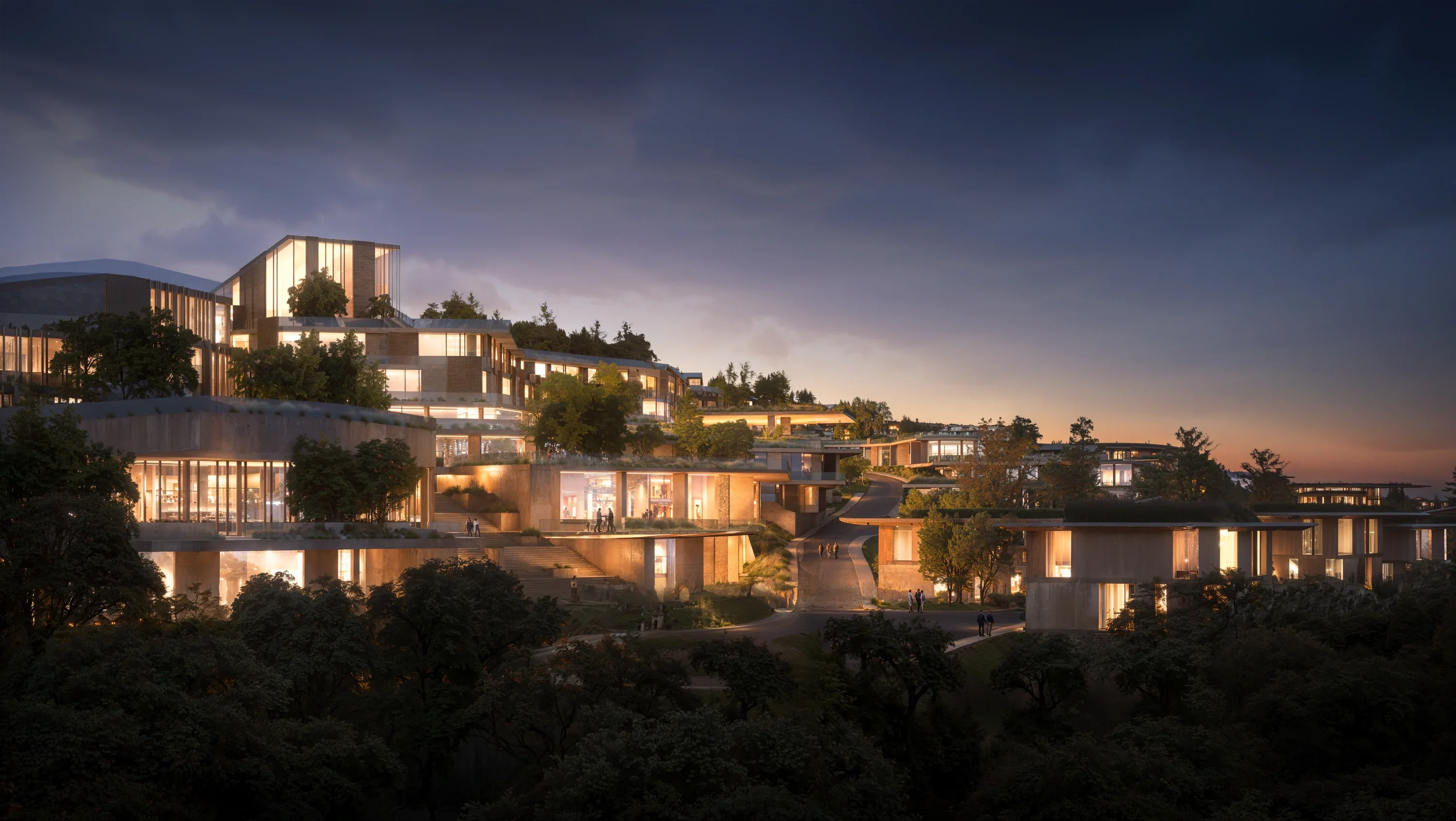 Mira Verde residences stepping down the slope at blue hour, windows lit