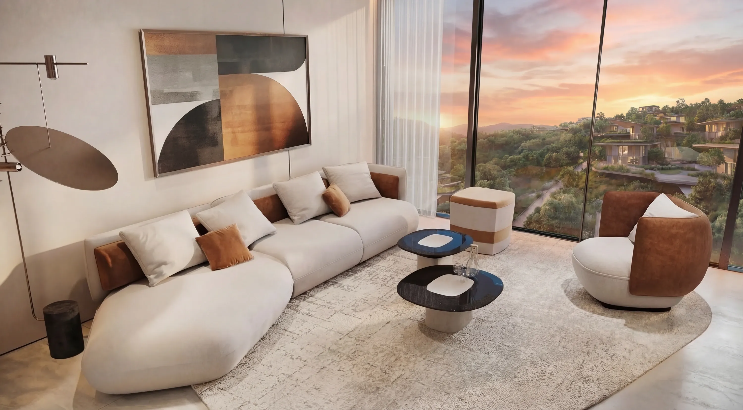 A Trussardi Casa living room with a curved sofa and artwork, at sunset