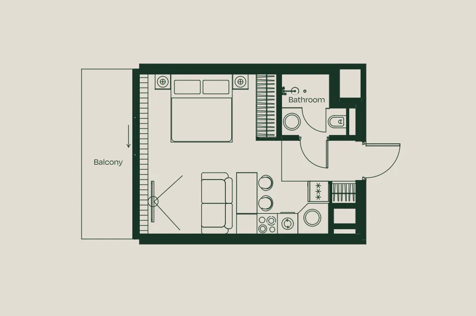 Plan de studio : espace nuit et séjour ouvert avec kitchenette, salle d’eau séparée et balcon sur toute la largeur du logement.